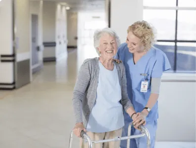 Senior adult completing balance training exercises safely with a physical therapist